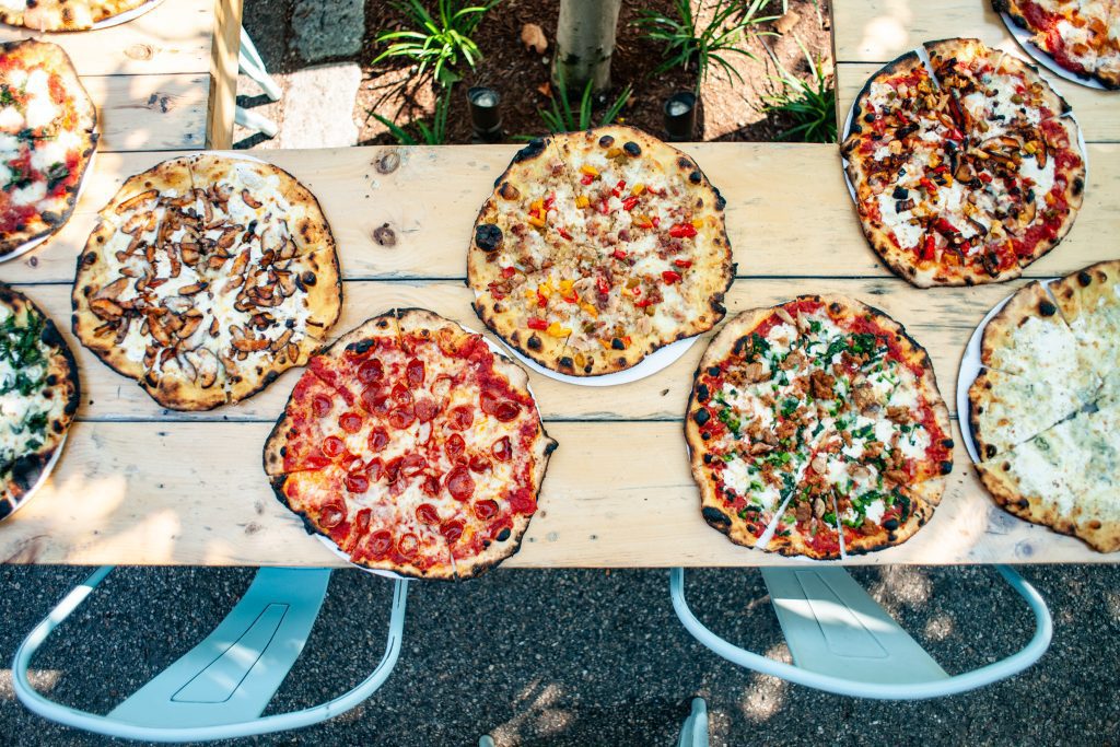 tables of various pizzas